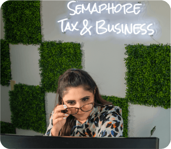 woman at desk at semaphore tax & business devision